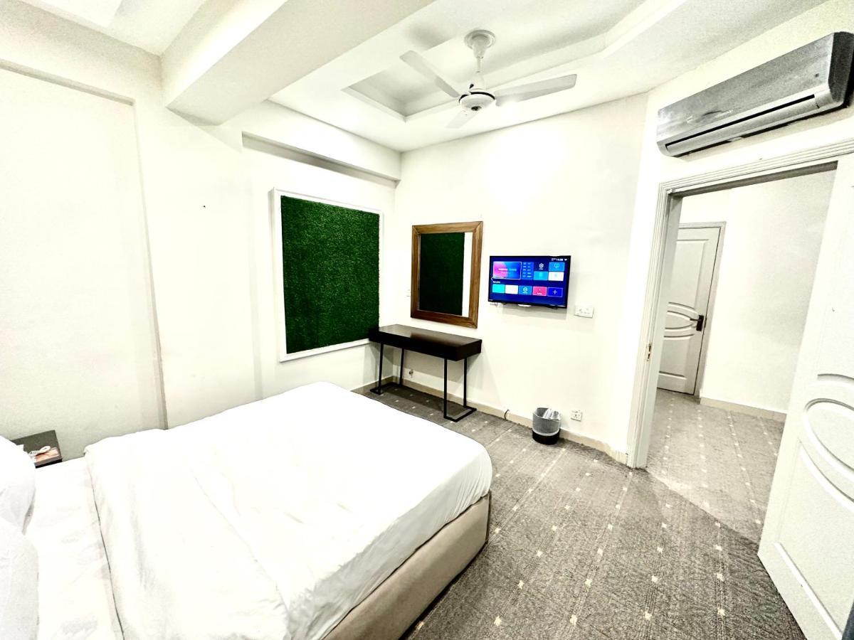 Mudan Hotel And Suite Islamabad Habitación foto